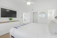 Waterfront Oasis 2BR/2BA with Pool, Gym, Balcony & Parking