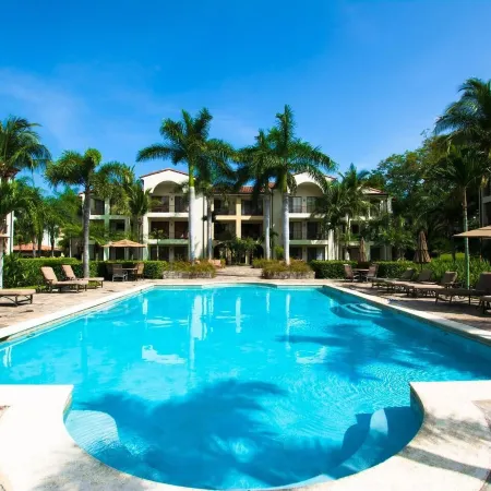 Spacious One-Bedroom Condo with Pool View, Balcony & Beach Club Access