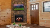Hot tub cabin with fireplace, Smoky Mountain views, pet friendly, 10 min to Park