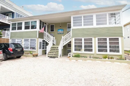 Dewey Beach House.  Just steps from the Ocean and all the Dewey fun spots Hotels in Dewey Beach