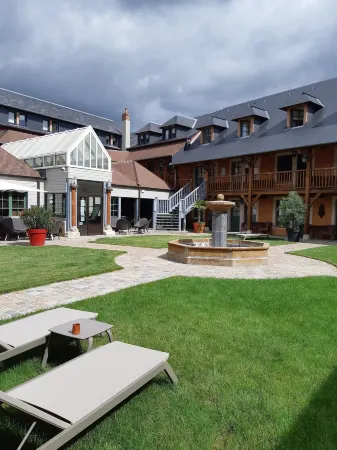 Hotel et Spa le Lion d'Or Отели в г. Рё