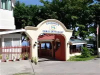 Coral Dive Resort Hotels near Sunken Cemetery