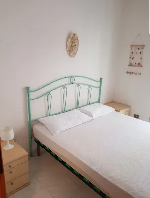 Beachfront apartment beach below Hotel a Rivabella