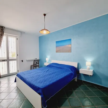 Home Fronte Mare Blue Отели в г. Torre San Giovanni Ugento