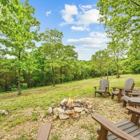 Branson Tiny Home on 52 Acres w/ Private Stocked Pond 1/4 mile hike from home!