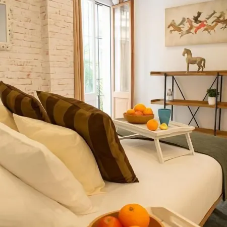 Apartamentos Sevilla Palace Отели рядом с достопримечательностью «Монастырь Ла-Картуха»