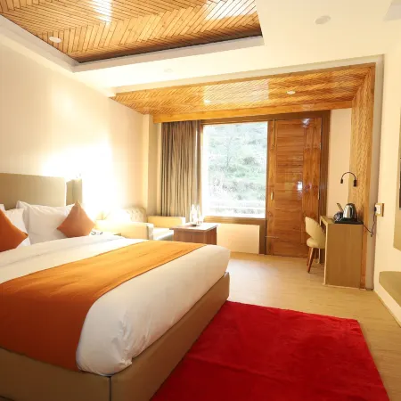 Udit Regency by West Western Kasol ( Central Heated and Air Cooled )
