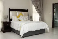 Letsatsing Lodge Hotels near Platinum Square Shopping Centre