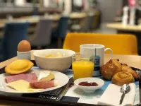 كيرياد ليموجيس سنتر - جار - أتريوم - فطور