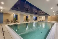 City Center Apartments Spa & Wellness by Apartmore - С бассейном