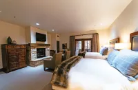 Deluxe Two Queen Room with Fireplace Hotel Room Hotels in Brighton