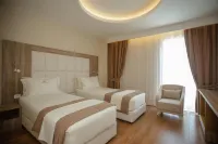 Kompleksi Exalco-Al Отели в г. 