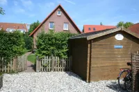 150m to the beach with private beach chair, south-facing garden, WLAN, SAUNA, barbecue, handcart Hotels in Schonberger Strand
