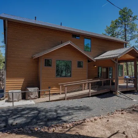 OASIS IN THE FOREST ON 1.25 ACRE BACKING TO NATIONAL FOREST WITH AC-PETS WELCOME