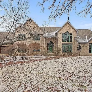10,000 Sq. Ft. Home on 15 hunting acres with an in-door pool and sauna