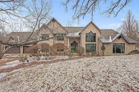 10,000 Sq. Ft. Home on 15 hunting acres with an in-door pool and sauna