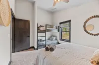 Duplex in popular development, outdoor pool access, paved roads, lots of parking
