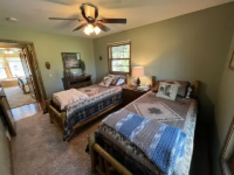 Private lakefront home. Sandy beach canoe, 2 kayaks. Pool, Spa & Pontoon rental.