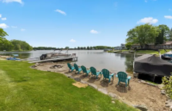 Canadian Lakes Lakefront Home with Breathtaking Sunrises and a Hot Tub!