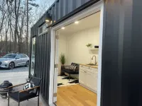 Cozy cabin and contemporary container home on one property! Pets welcome!