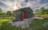 Secluded Summer Cabin Near Trails w/ Firepit, Hot Tub & Stargazing Views!