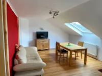 Cozy vacation apartment "Schwalbennest" under the roof with garden access