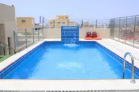 Areen Al Naeem Served Apartments - ที่มีสระว่ายน้ำ