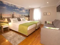 Famous Crows Lisbon Suites Отели рядом с достопримечательностью «Башня Торре-де-Белен»