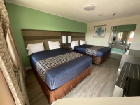 เอ็กซีคิวทีฟ อินน์ แอนด์ สวีตส์