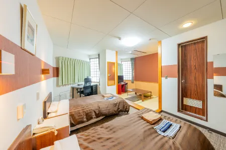 Mimatsu Hotel Отели рядом с достопримечательностью «Mitoshi Okushikaizuka Fureai Park»