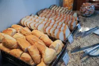 坎皮納斯歐羅套房國民飯店-坎布伊 - 早餐