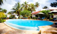 Flame Tree Cottages - Beach