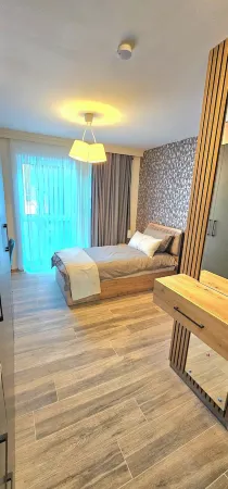 Hira Boarding Aparthotel Отели в г. Дингольфинг-Ландау