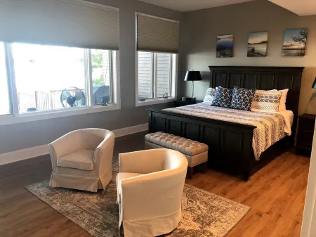 WELCOME TO ON THE ROCK - A RECENTLY RENOVATED  BEAUTIFUL LAKE FRONT HOME