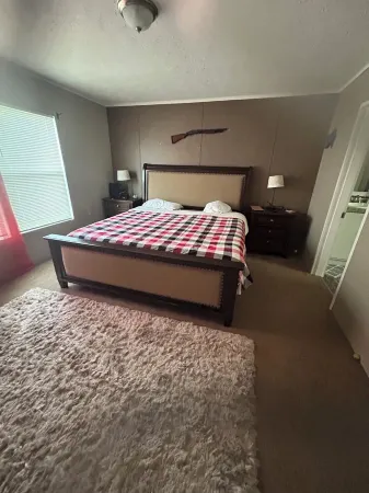 4-bedroom home on 5.75 acres. Home is located near Chimney Oaks Golf Course.