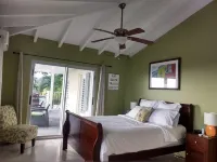 MILLION DOLLAR VIEW SET ATOP ONE ACRE OF CARIBBEAN SLENDOR