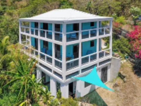Verandah-style Living Overlooking Coral Bay Hotels in Central