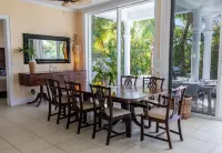 Stunning waterfront property with panoramic sunset views + pool + dock