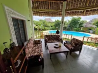 Dream villa Maisha Mazuri with staff Отели в г. Мсамбуэни