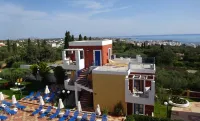 Astra Village & Suites Hotel di 