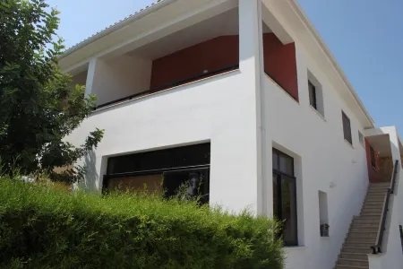 Two very large, bright apartment with private garden, pool and grill