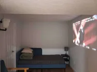 Private bathroom, living room with projector - Basement Suite for 3