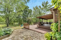 Peaceful Lakefront Cabin Retreat with Hot Tub!