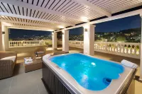 Aenos Hotel - bañera