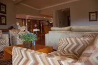 Plaza Inn Week Inn - Parkering