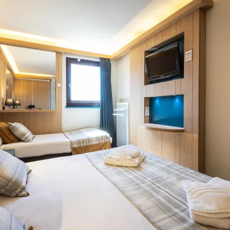 Living for Three in the Heart of Huez
