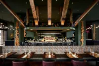Grand Bohemian Lodge Greenville, Autograph Collection - bar