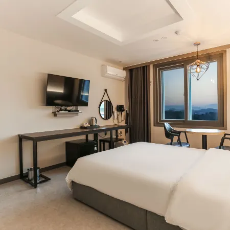 Hotel Juno Отели рядом с достопримечательностью «Пляж Канмун»