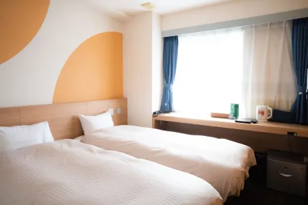 Hotel Raffinato Chitose Отели в г. Титосэ