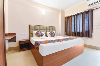 FabExpress Central Plaza Hotels near Graphic Era (Deemed to be University)